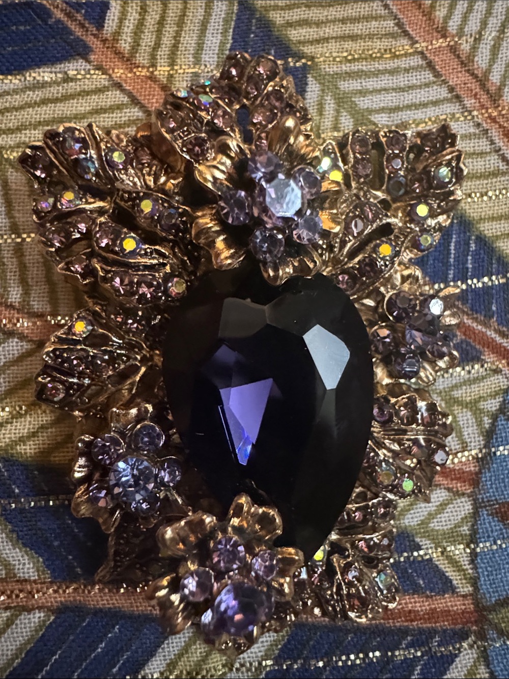 Gold-tone Floral Brooch with Deep Purple Heart Stone
